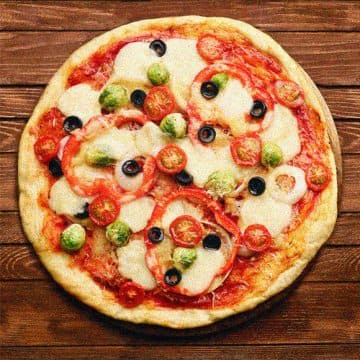 Pizza con verduras y hierbas